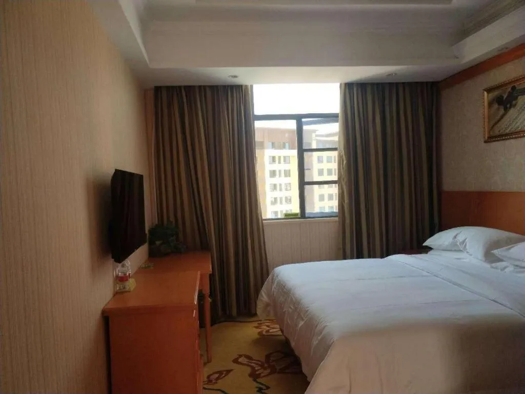 Bed in Vienna Hotel Hubei Enshi Railway Station