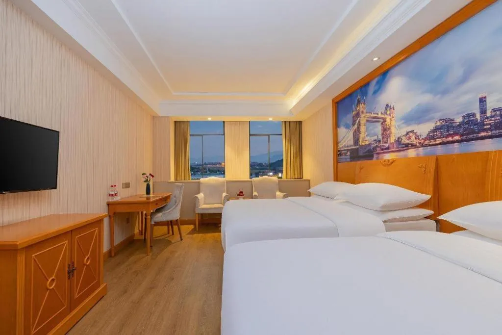 Bed in Vienna Hotel Hubei Enshi Railway Station