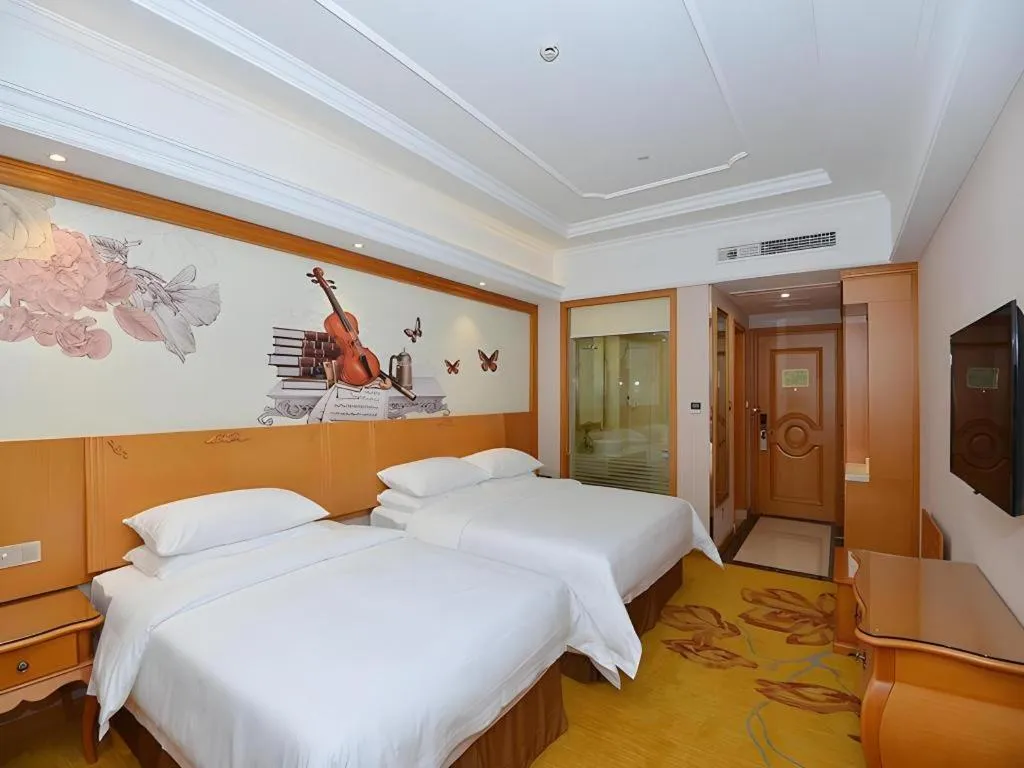 Bed in Vienna Hotel Shanghai Songjiang Market Miaoqian Street