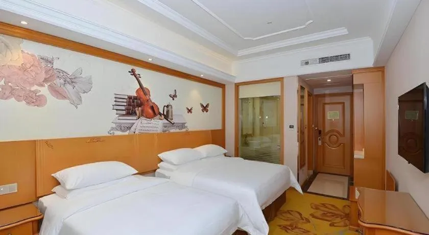 Bed in Vienna Hotel Shanghai Songjiang Market Miaoqian Street