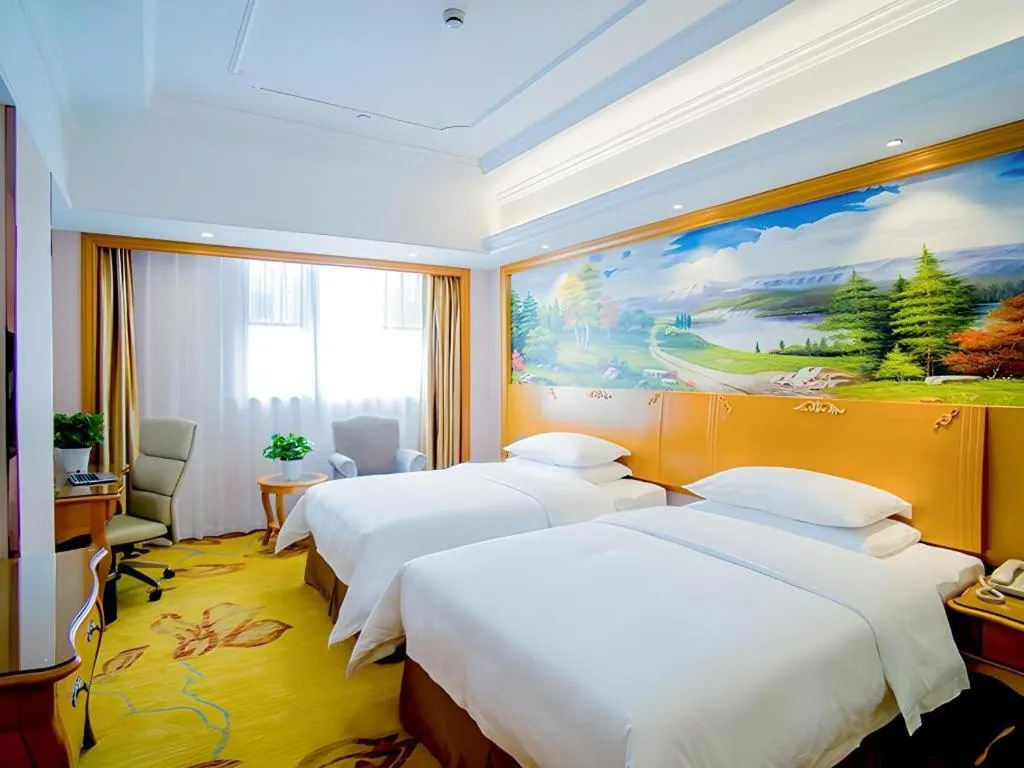 Bed in Vienna Hotel Shanghai Songjiang Market Miaoqian Street