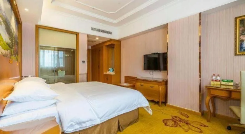 Bed in Vienna Hotel Shanghai Songjiang Market Miaoqian Street