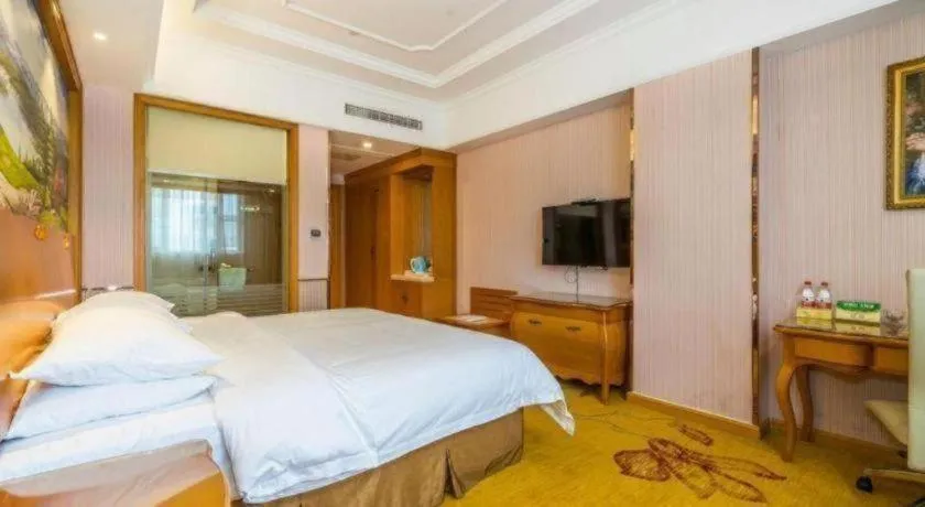 Bed in Vienna Hotel Shanghai Songjiang Market Miaoqian Street