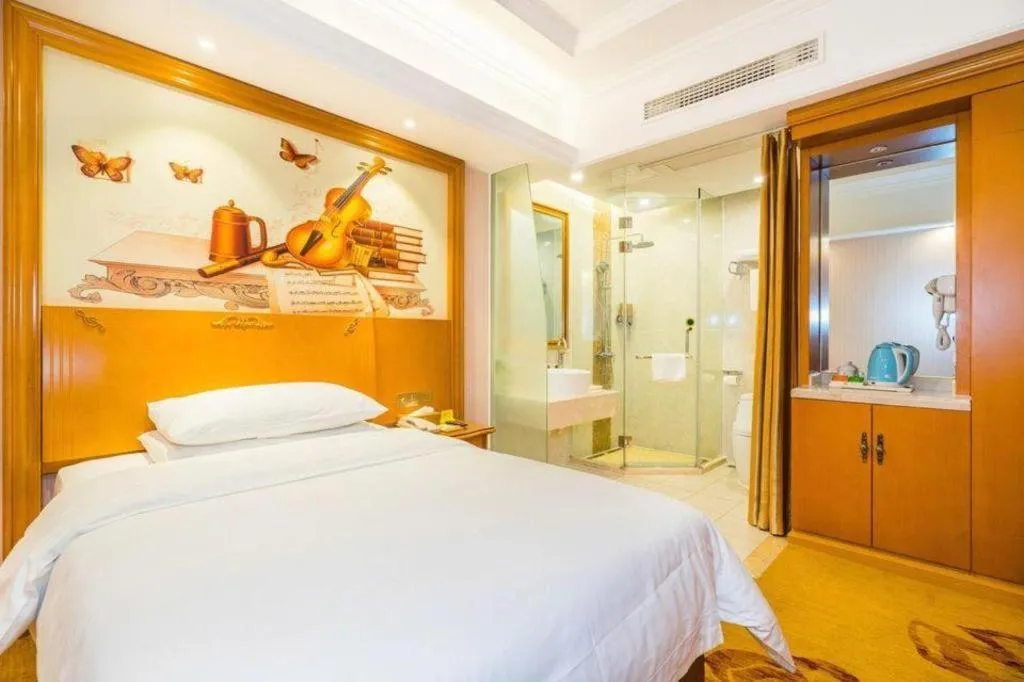 Bed in Vienna Hotel Shanghai Songjiang Market Miaoqian Street