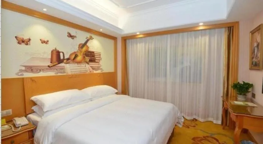 Bed in Vienna Hotel Shanghai Songjiang Market Miaoqian Street