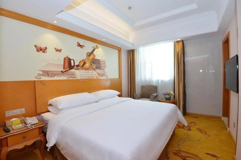 Bed in Vienna Hotel Shanghai Songjiang Market Miaoqian Street