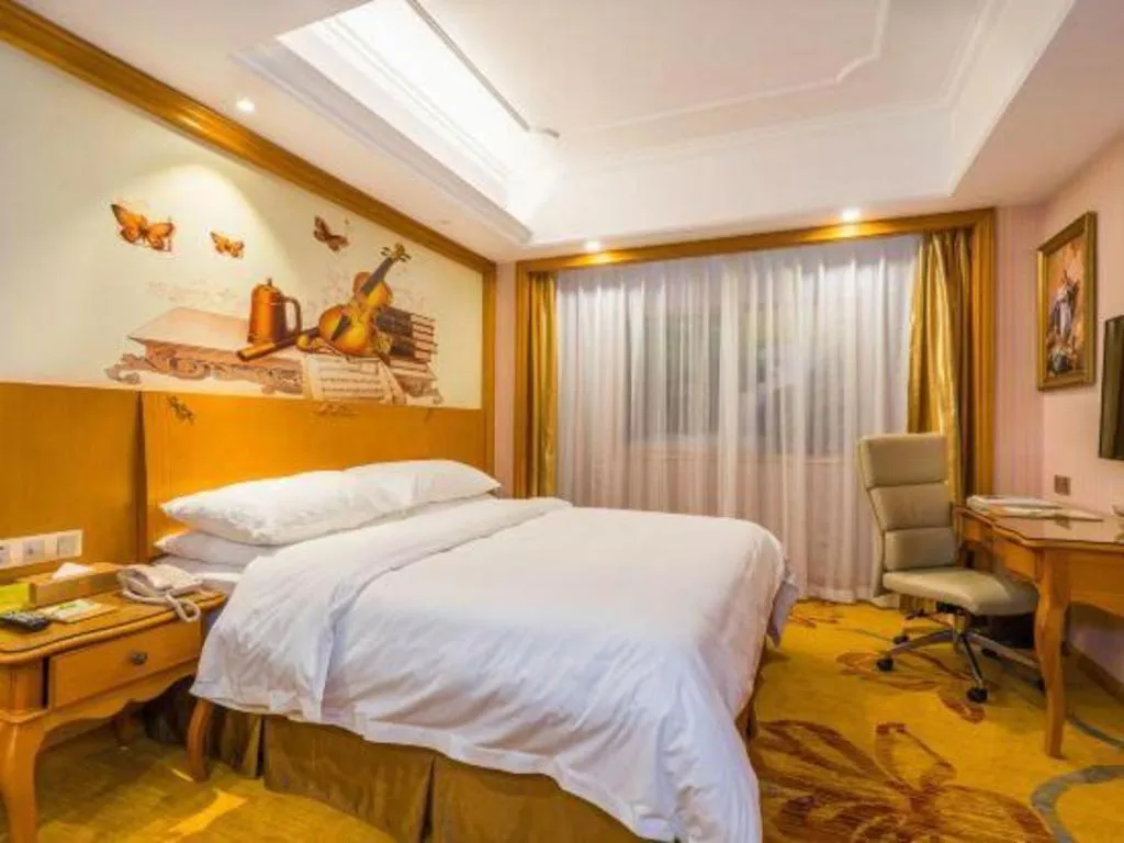 Bed in Vienna Hotel Shanghai Songjiang Market Miaoqian Street