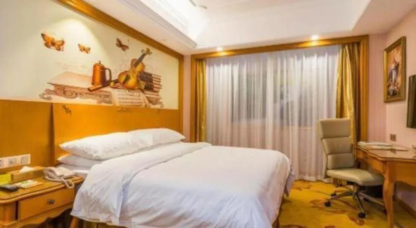 Bed in Vienna Hotel Shanghai Songjiang Market Miaoqian Street