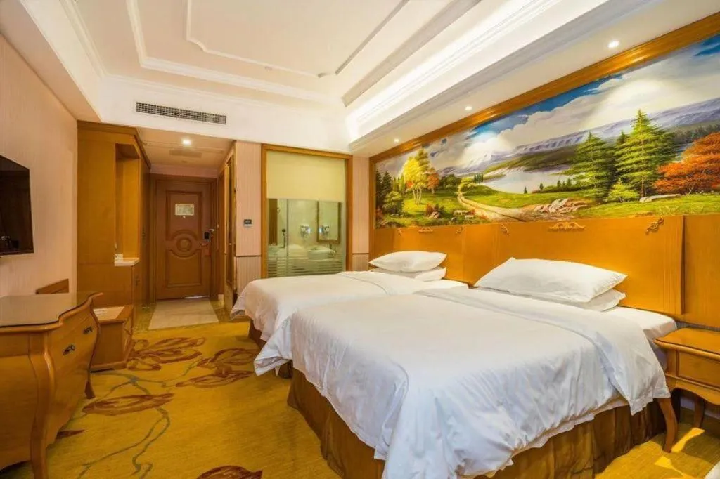 Bed in Vienna Hotel Shanghai Songjiang Market Miaoqian Street