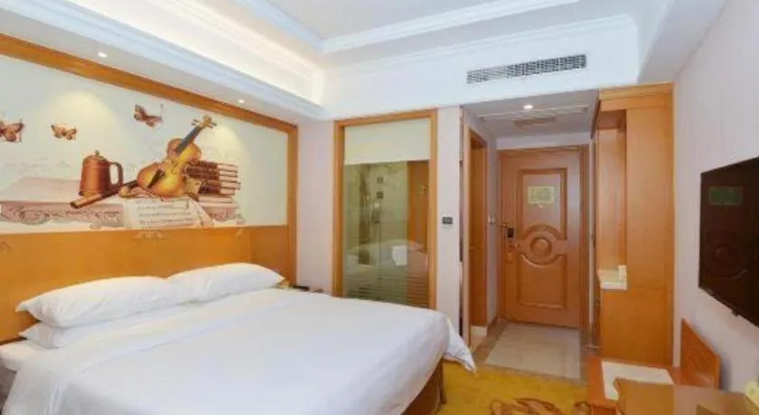 Bed in Vienna Hotel Shanghai Songjiang Market Miaoqian Street