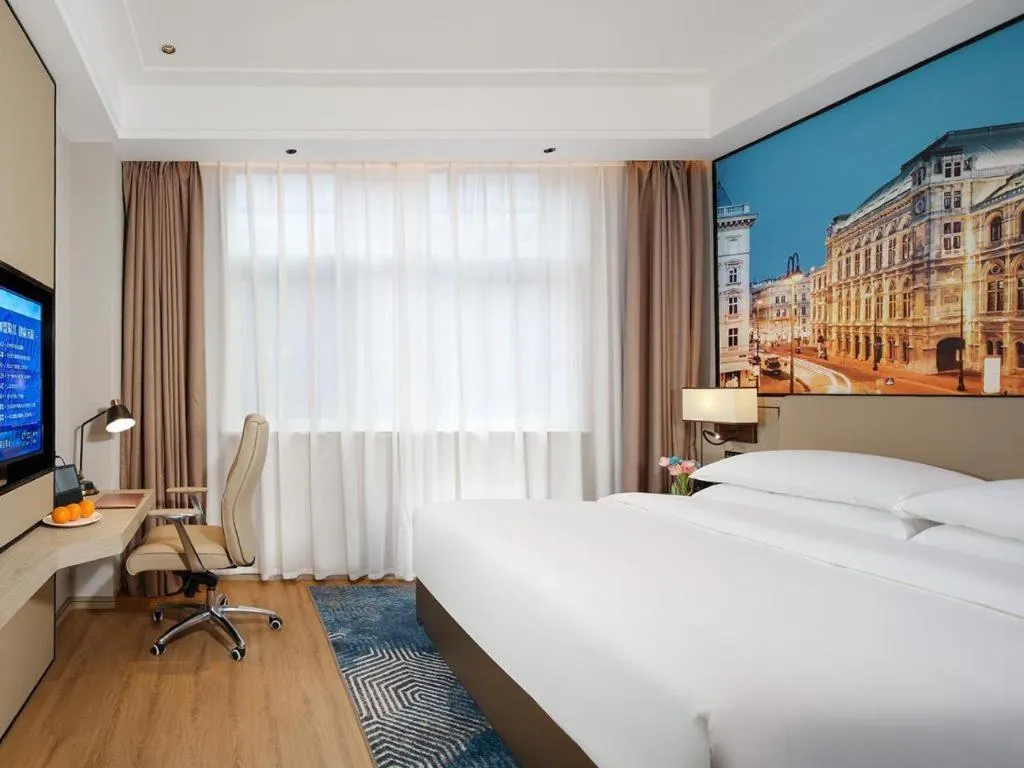 Bed in Vienna Hotel Shaanxi Xiianyang Yangling South Station