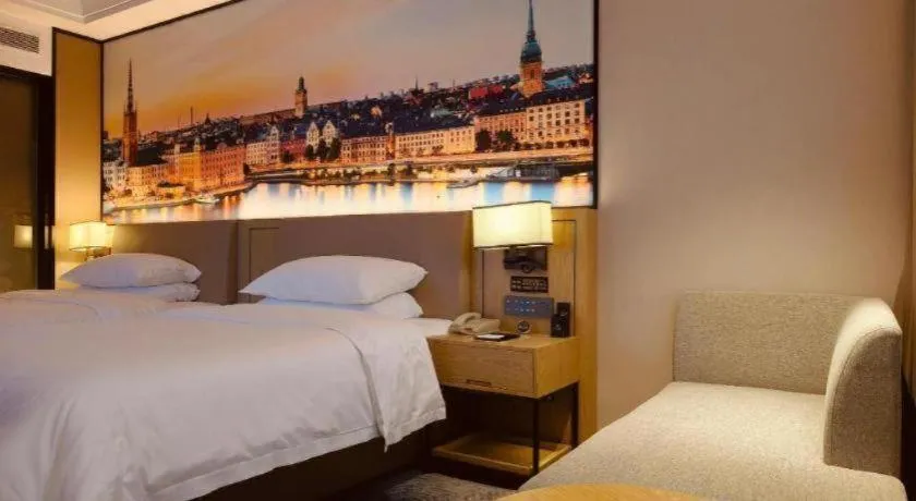 Bed in Vienna Hotel Shaanxi Xiianyang Yangling South Station