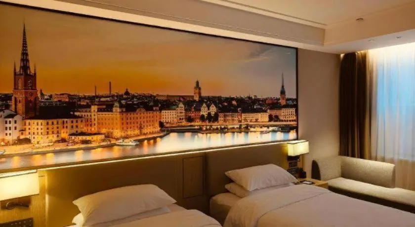 Bed in Vienna Hotel Shaanxi Xiianyang Yangling South Station