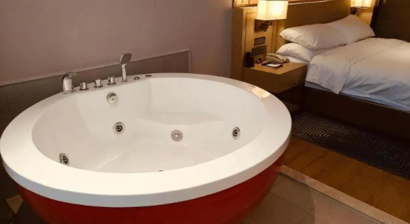 Bed in Vienna Hotel Shaanxi Xiianyang Yangling South Station