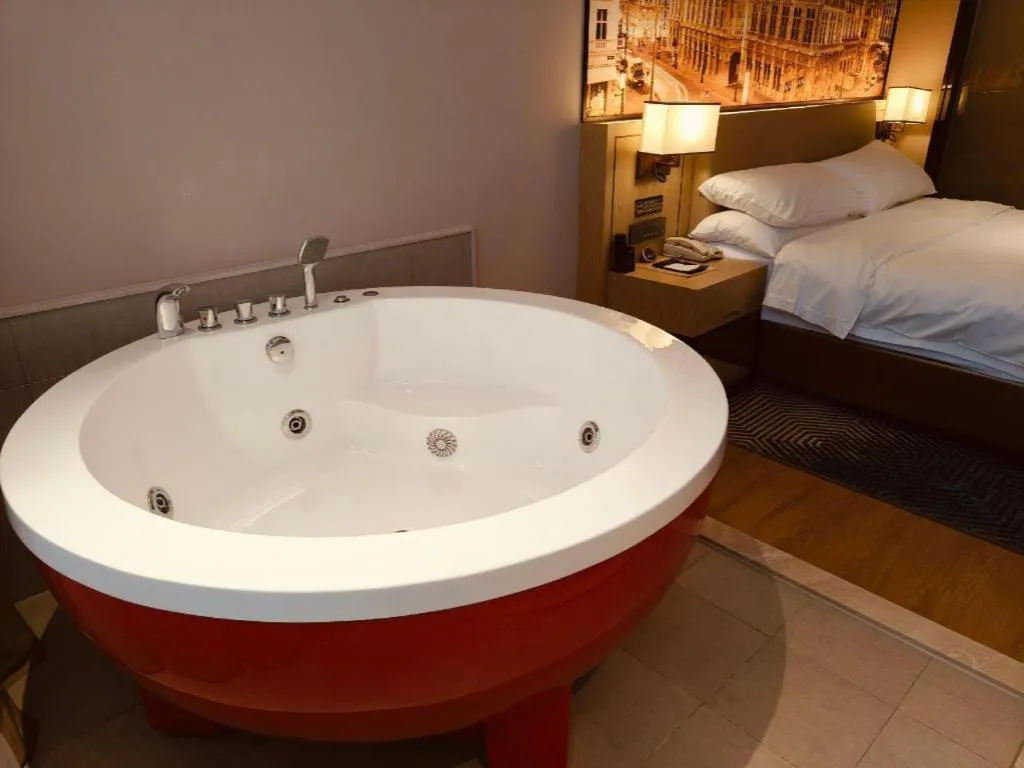 Bed in Vienna Hotel Shaanxi Xiianyang Yangling South Station