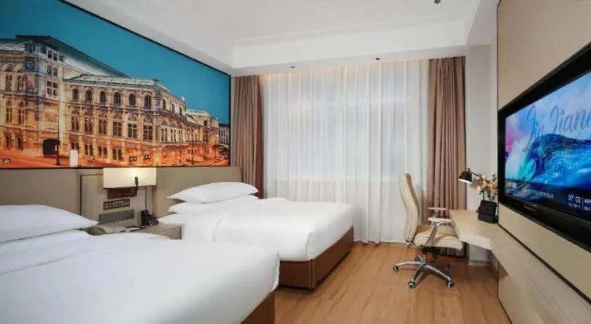 Bed in Vienna Hotel Shaanxi Xiianyang Yangling South Station