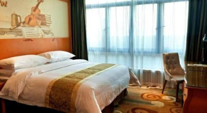 Bed in Vienna Hotel Guangdong Zhongshan Ancient Town Haizhou