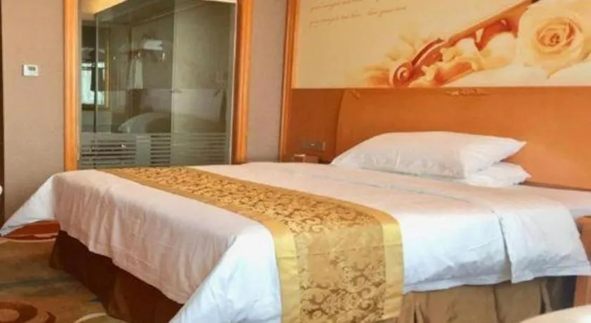 Bed in Vienna Hotel Guangdong Zhongshan Ancient Town Haizhou