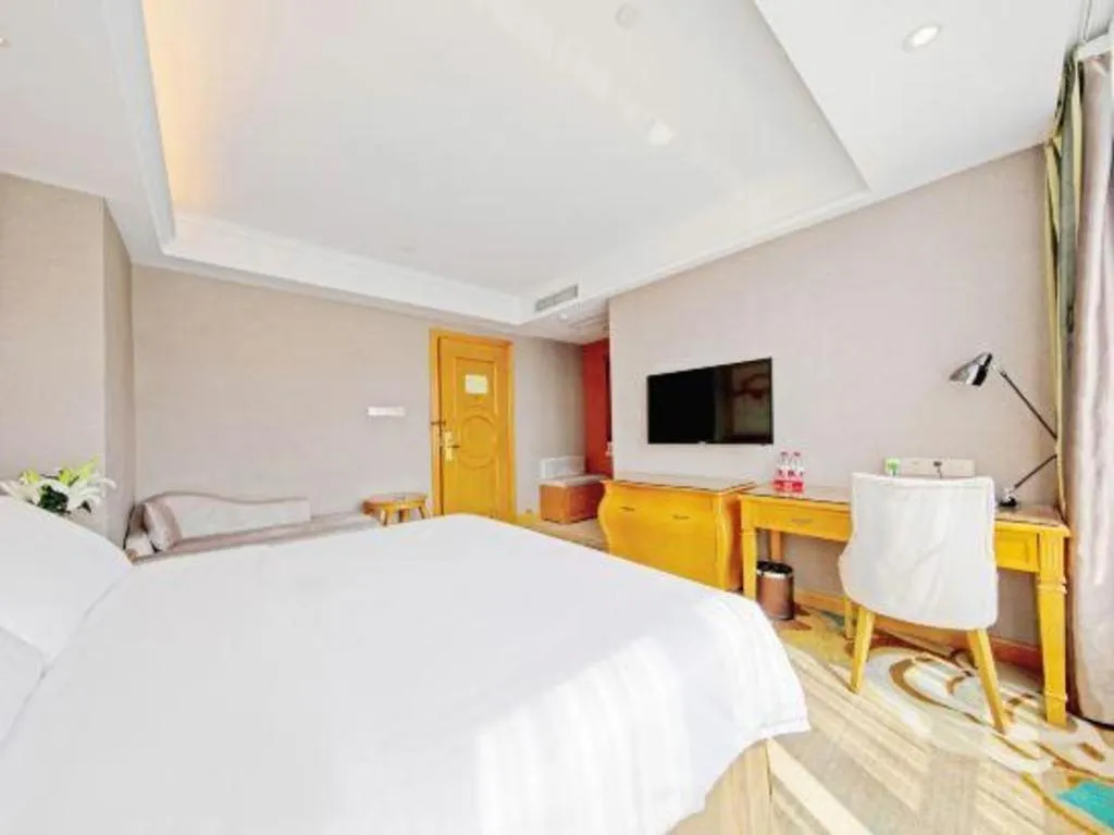 Bed in Vienna Hotel Guangdong Zhongshan Ancient Town Haizhou