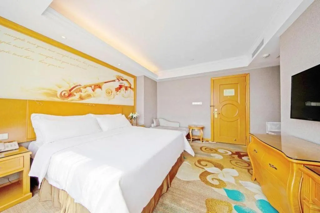 Bed in Vienna Hotel Guangdong Zhongshan Ancient Town Haizhou