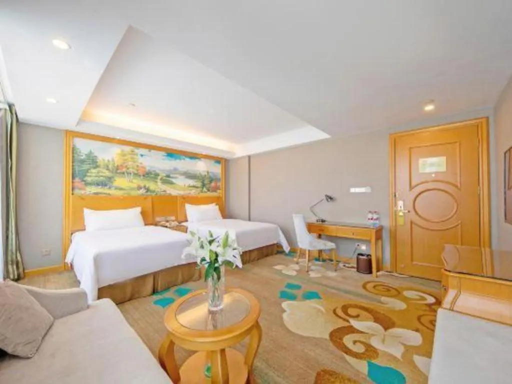 Bed in Vienna Hotel Guangdong Zhongshan Ancient Town Haizhou