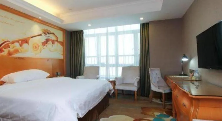 Bed in Vienna Hotel Guangdong Zhongshan Ancient Town Haizhou
