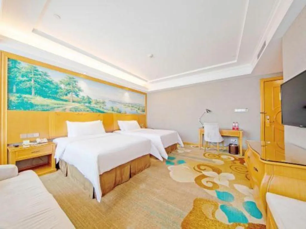 Bed in Vienna Hotel Guangdong Zhongshan Ancient Town Haizhou