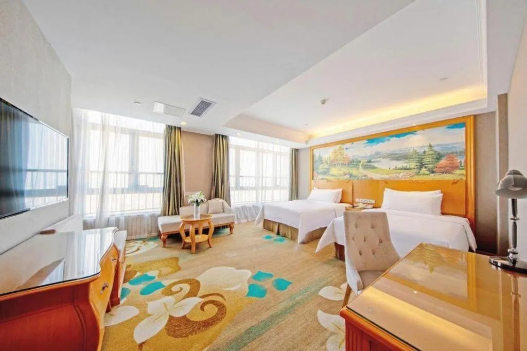 Bed in Vienna Hotel Guangdong Zhongshan Ancient Town Haizhou