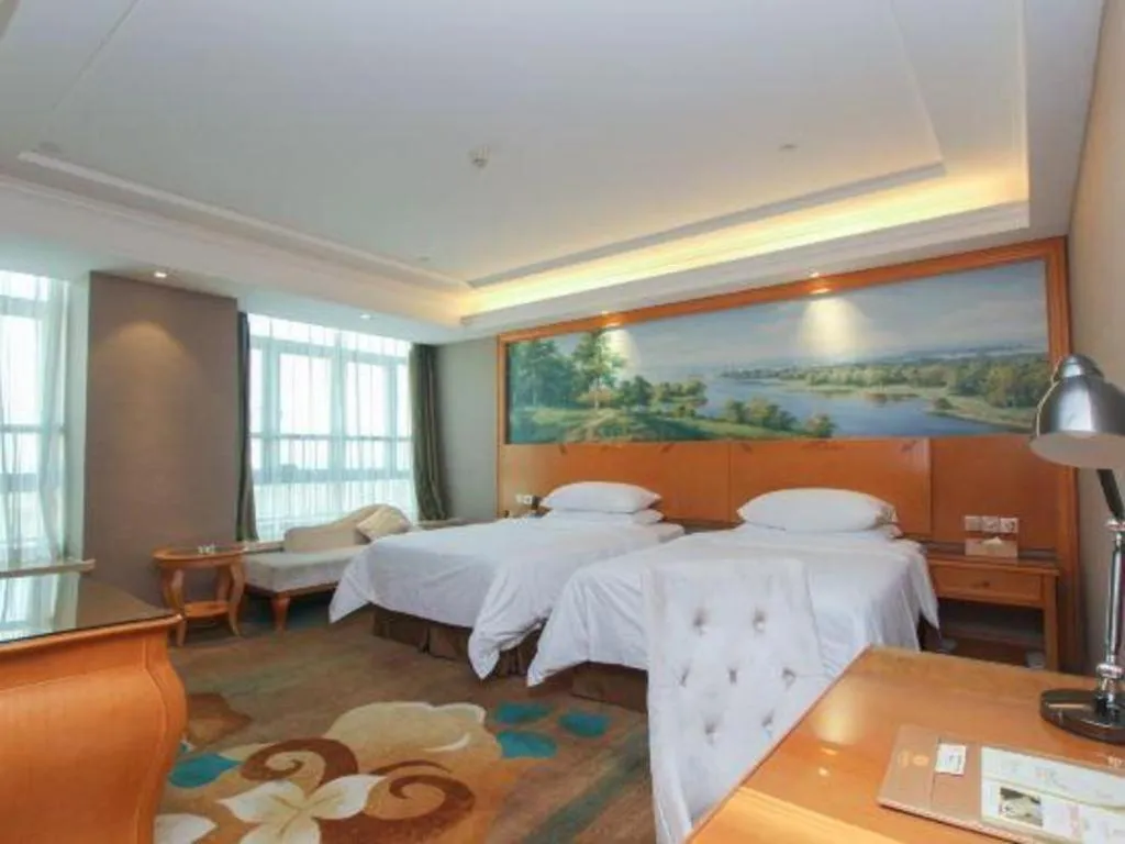 Bed in Vienna Hotel Guangdong Zhongshan Ancient Town Haizhou
