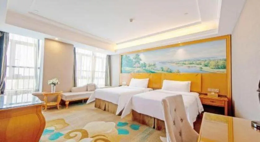 Bed in Vienna Hotel Guangdong Zhongshan Ancient Town Haizhou