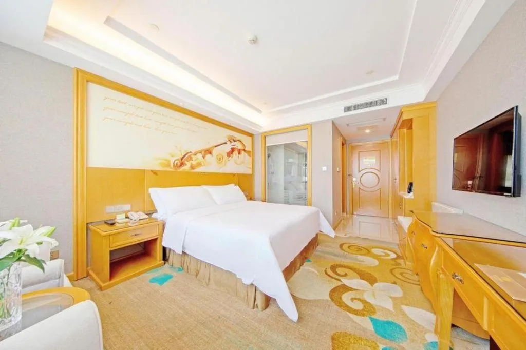 Bed in Vienna Hotel Guangdong Zhongshan Ancient Town Haizhou