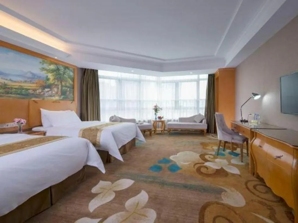 Bed in Vienna Hotel Guangdong Zhongshan Ancient Town Haizhou