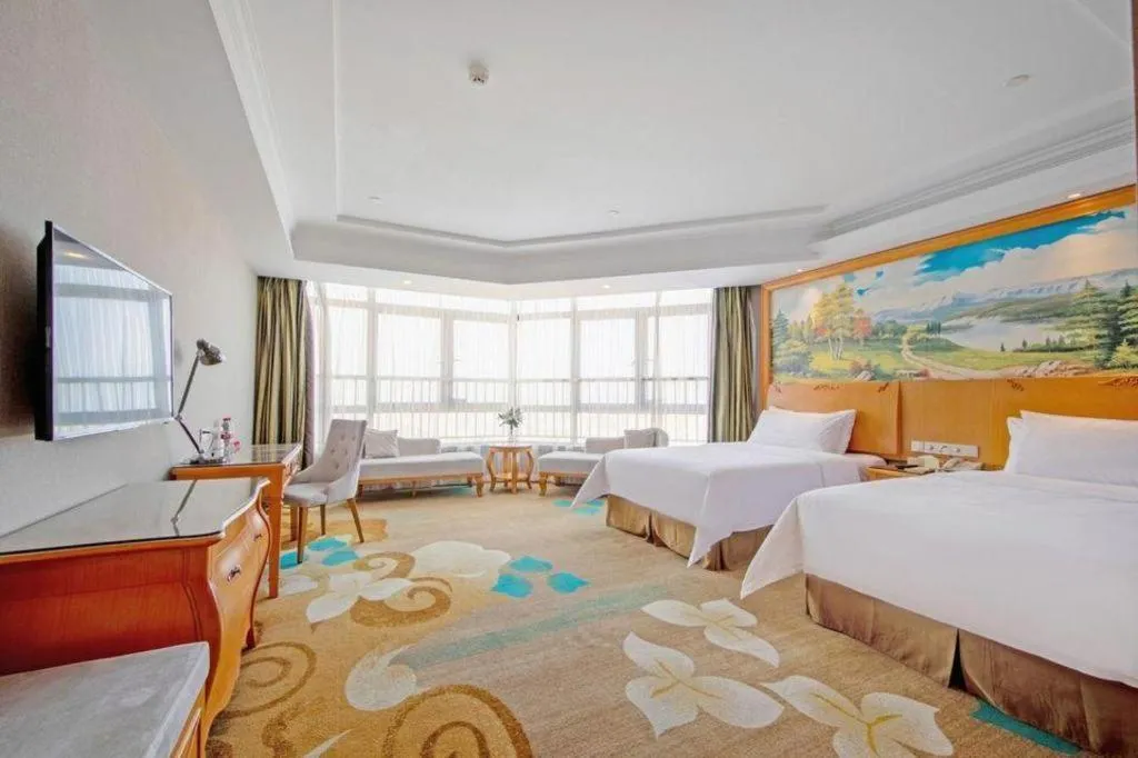 Bed in Vienna Hotel Guangdong Zhongshan Ancient Town Haizhou