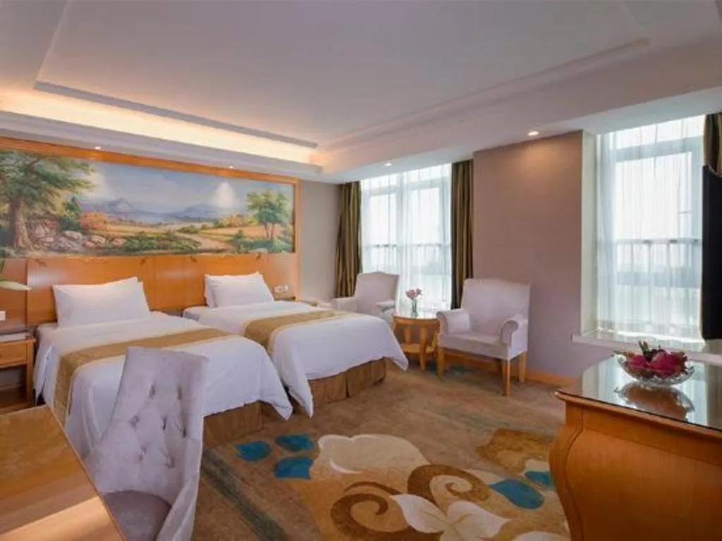 Bed in Vienna Hotel Guangdong Zhongshan Ancient Town Haizhou