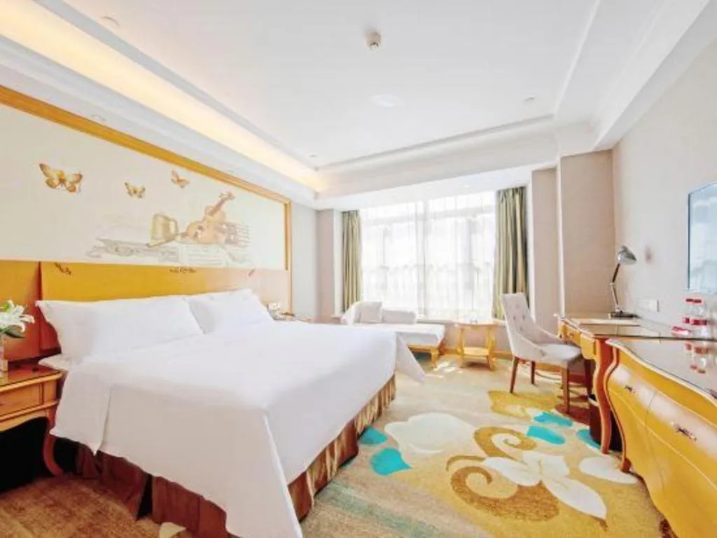 Bed in Vienna Hotel Guangdong Zhongshan Ancient Town Haizhou