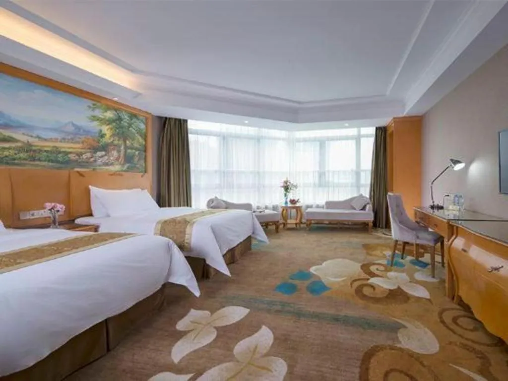 Bed in Vienna Hotel Guangdong Zhongshan Ancient Town Haizhou