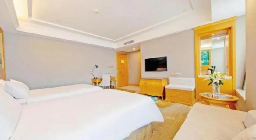 Bed in Vienna Hotel Guangdong Zhongshan Ancient Town Haizhou