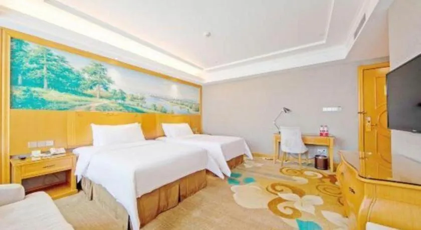 Bed in Vienna Hotel Guangdong Zhongshan Ancient Town Haizhou