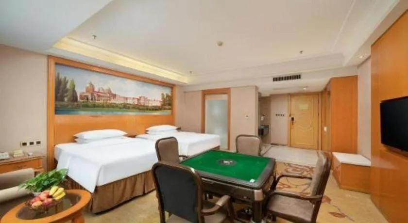 Bed in Vienna Hotel Nanning Anji Wanda 33rd Middle School Metro Station