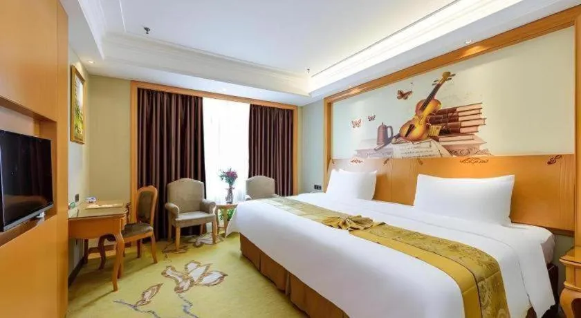 Bed in Vienna Hotel Nanning Anji Wanda 33rd Middle School Metro Station