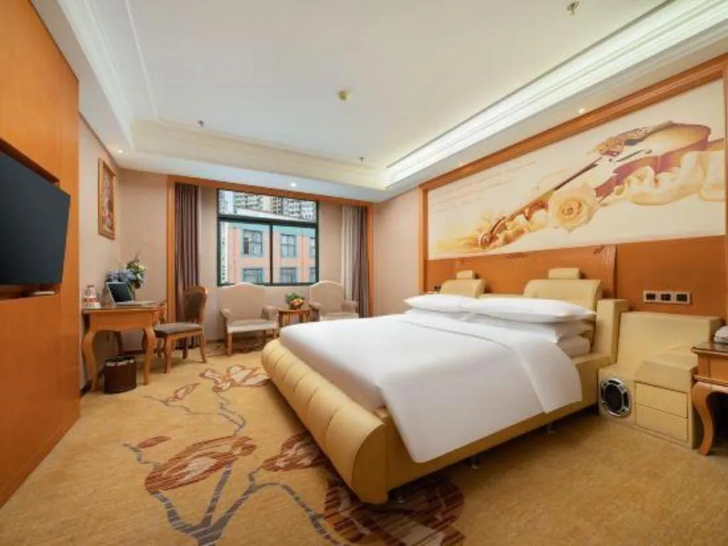 Bed in Vienna Hotel Nanning Anji Wanda 33rd Middle School Metro Station