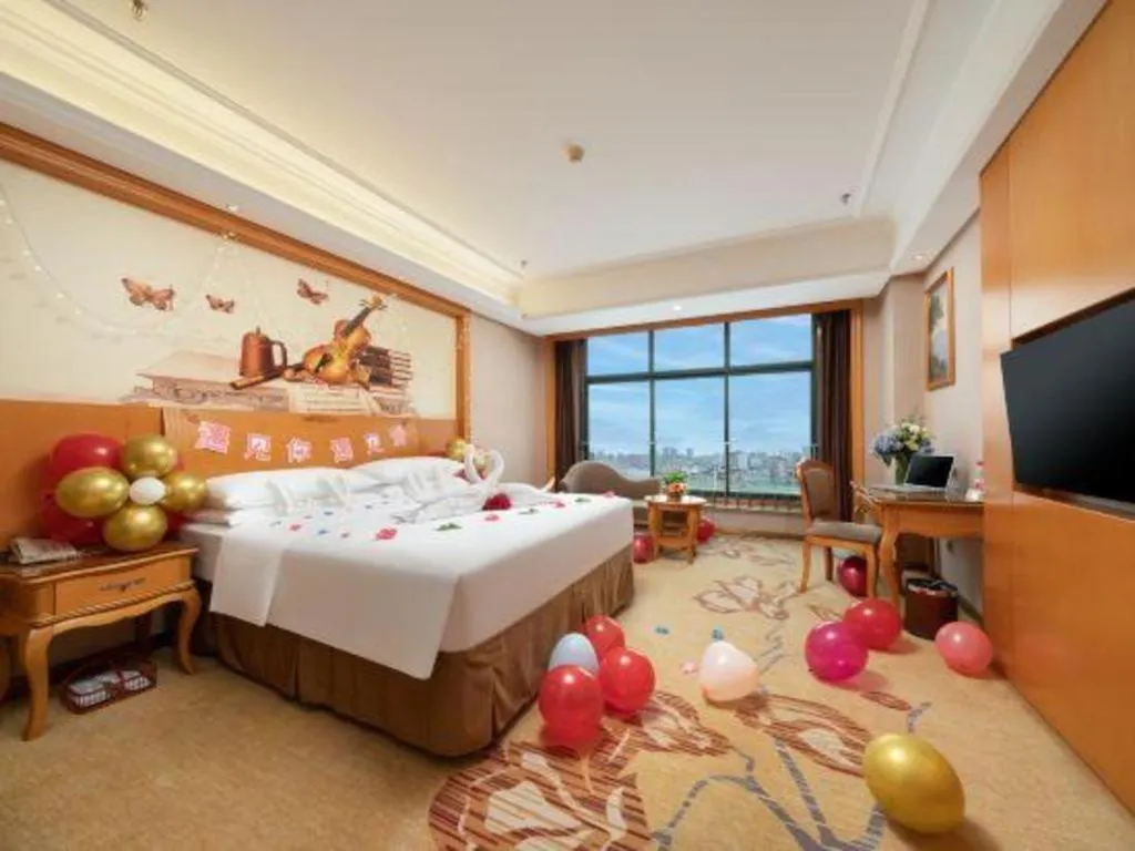 Bed in Vienna Hotel Nanning Anji Wanda 33rd Middle School Metro Station