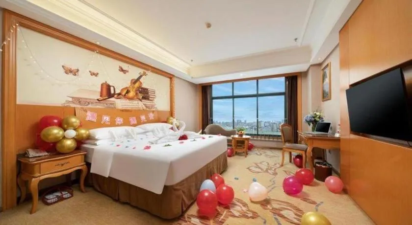 Bed in Vienna Hotel Nanning Anji Wanda 33rd Middle School Metro Station