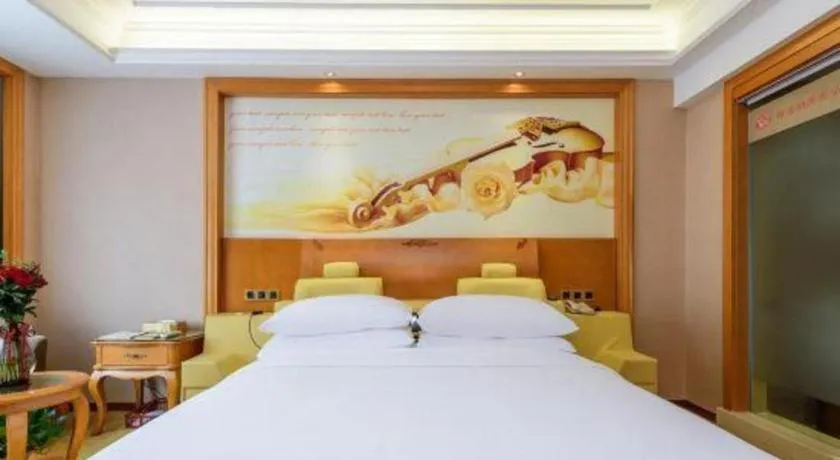 Bed in Vienna Hotel Nanning Anji Wanda 33rd Middle School Metro Station