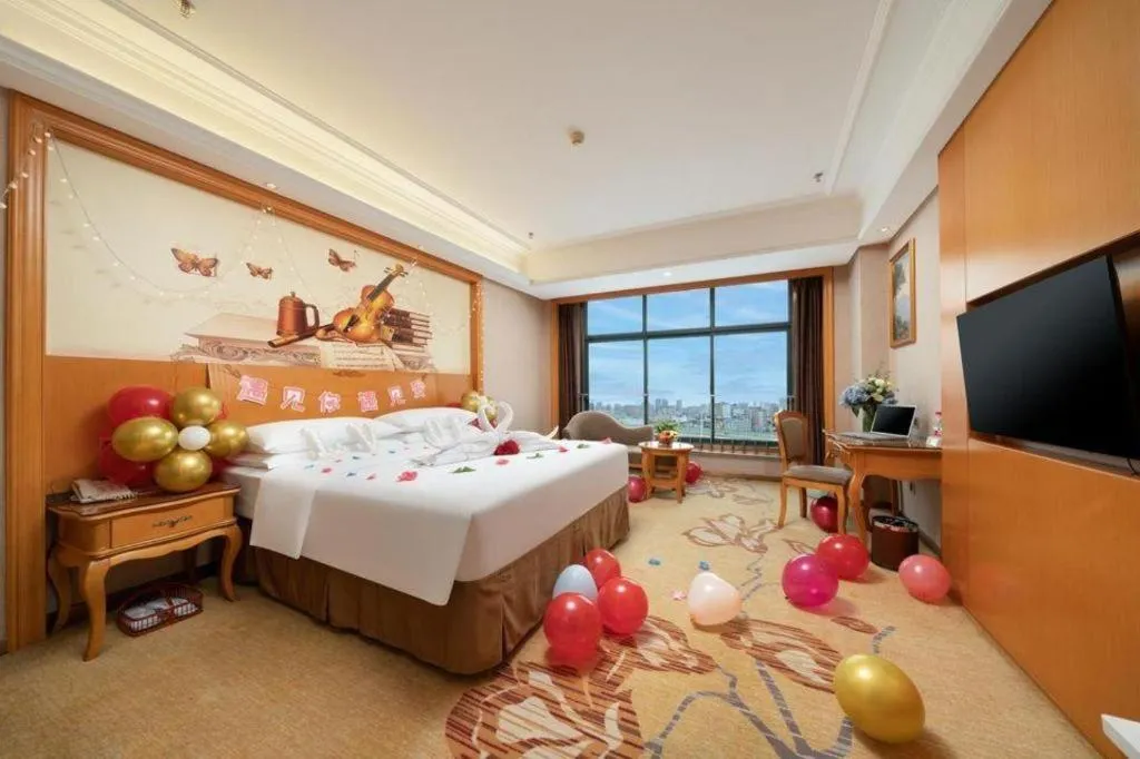 Bed in Vienna Hotel Nanning Anji Wanda 33rd Middle School Metro Station