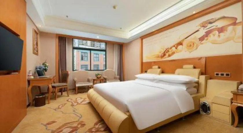Bed in Vienna Hotel Nanning Anji Wanda 33rd Middle School Metro Station