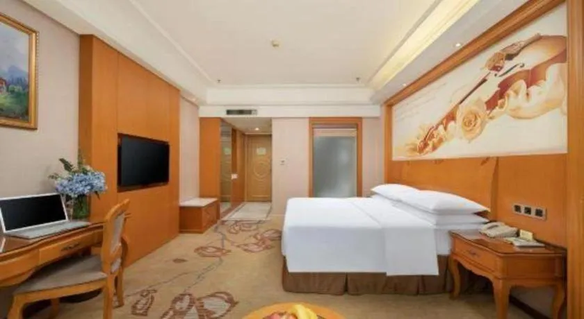 Bed in Vienna Hotel Nanning Anji Wanda 33rd Middle School Metro Station