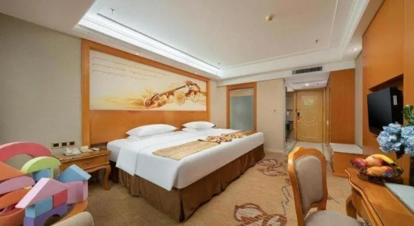 Bed in Vienna Hotel Nanning Anji Wanda 33rd Middle School Metro Station