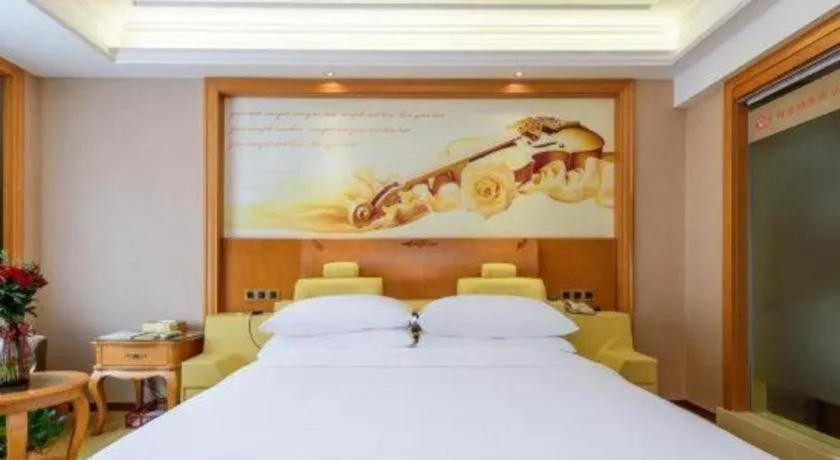 Bed in Vienna Hotel Nanning Anji Wanda 33rd Middle School Metro Station