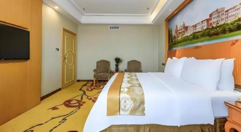 Bed in Vienna Hotel Nanning Anji Wanda 33rd Middle School Metro Station